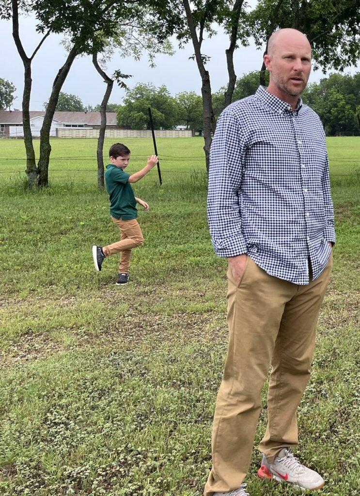 Ryan trying to herd the hellions for a Mother's Day photo